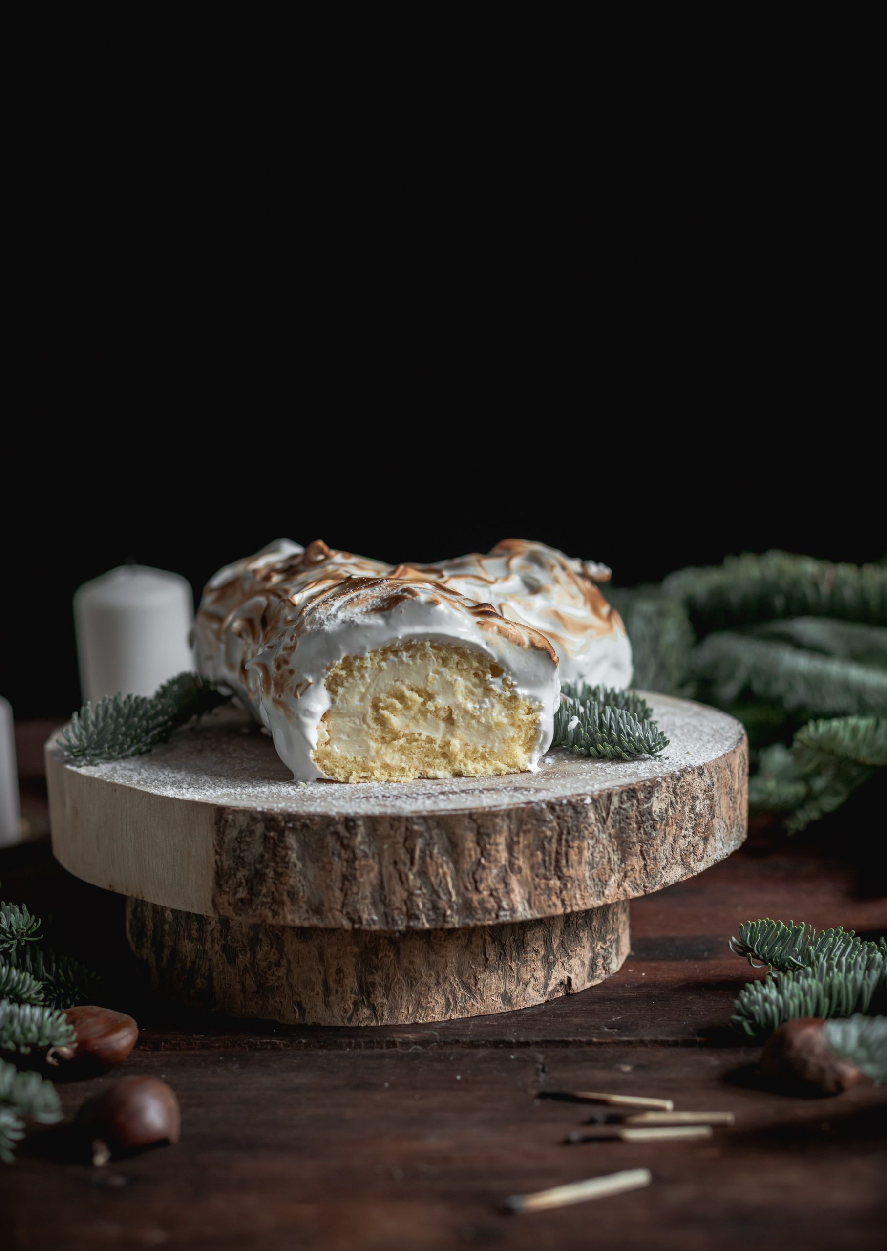 Christmas Yule Log Cake with lemon curd filling and meringue
